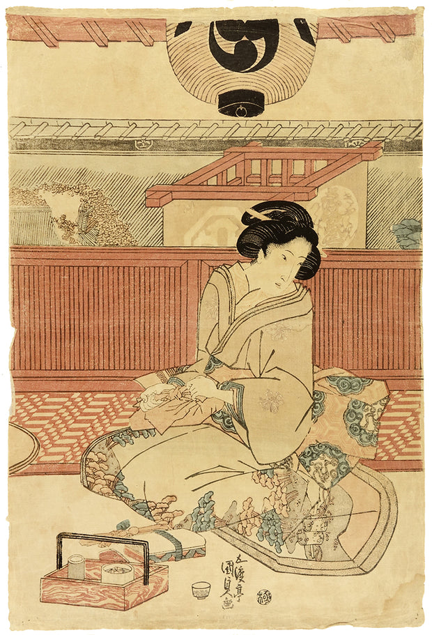 Beauty Wrapping a Package by Kunisada Utagawa as Toyokuni III - Davidson Galleries